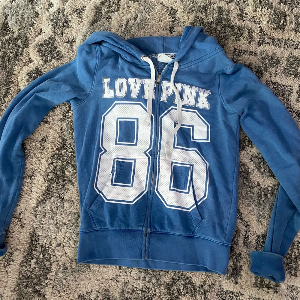 PINK jacket. Blue in color. Size small